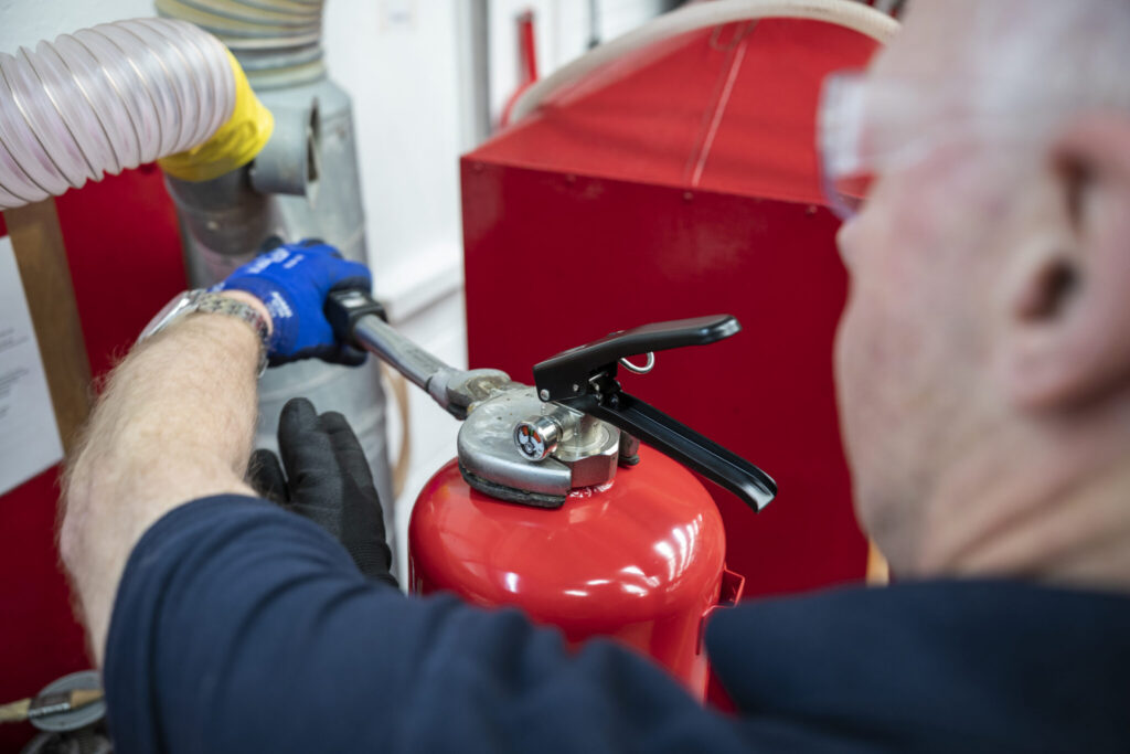 how is a fire extinguisher made